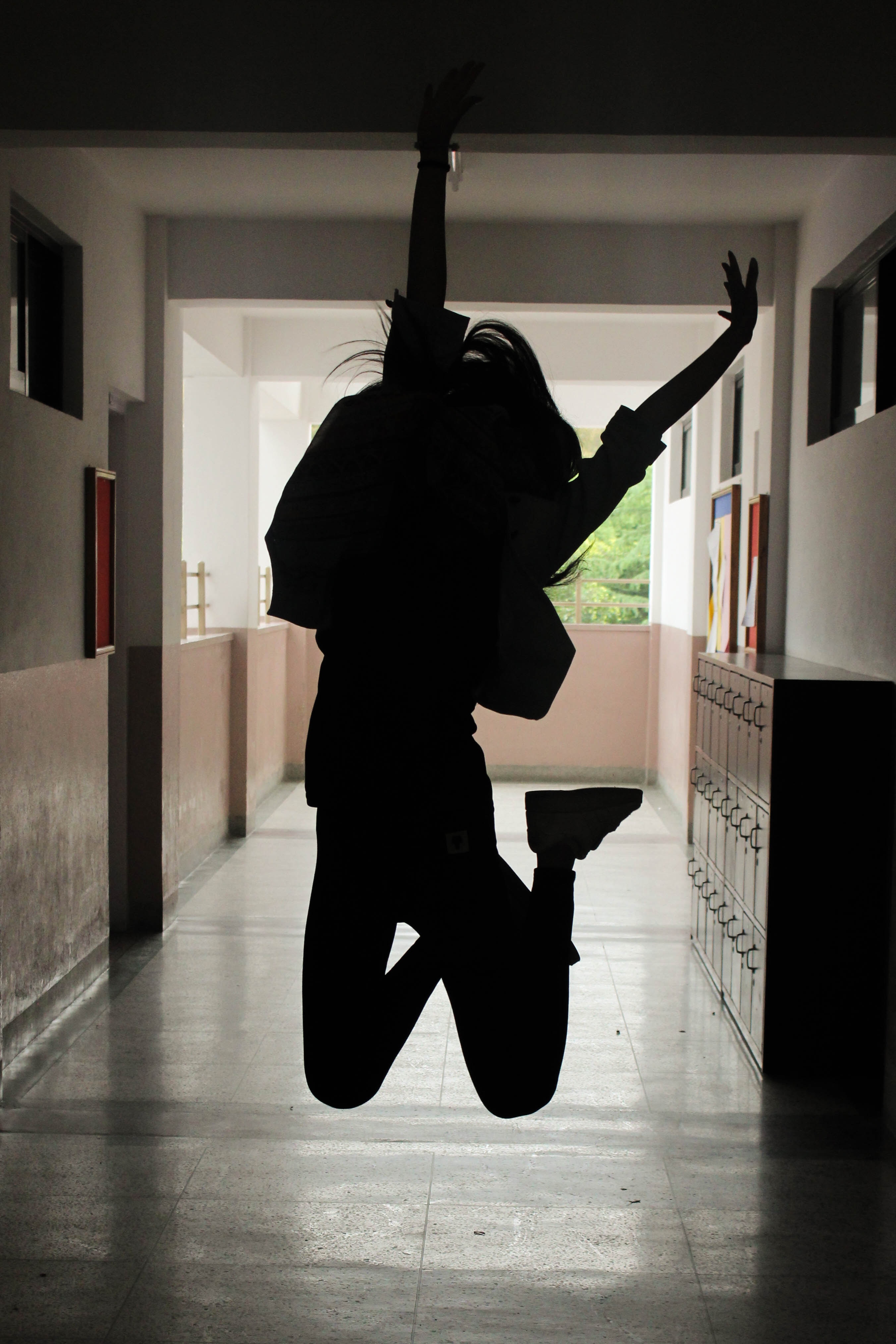  School girl jumping for joy