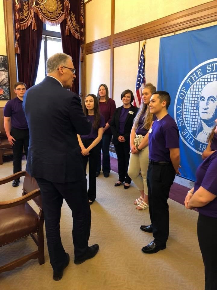 Photo of Matthew Suce at proclamation signing with Gov. Jay Inslee