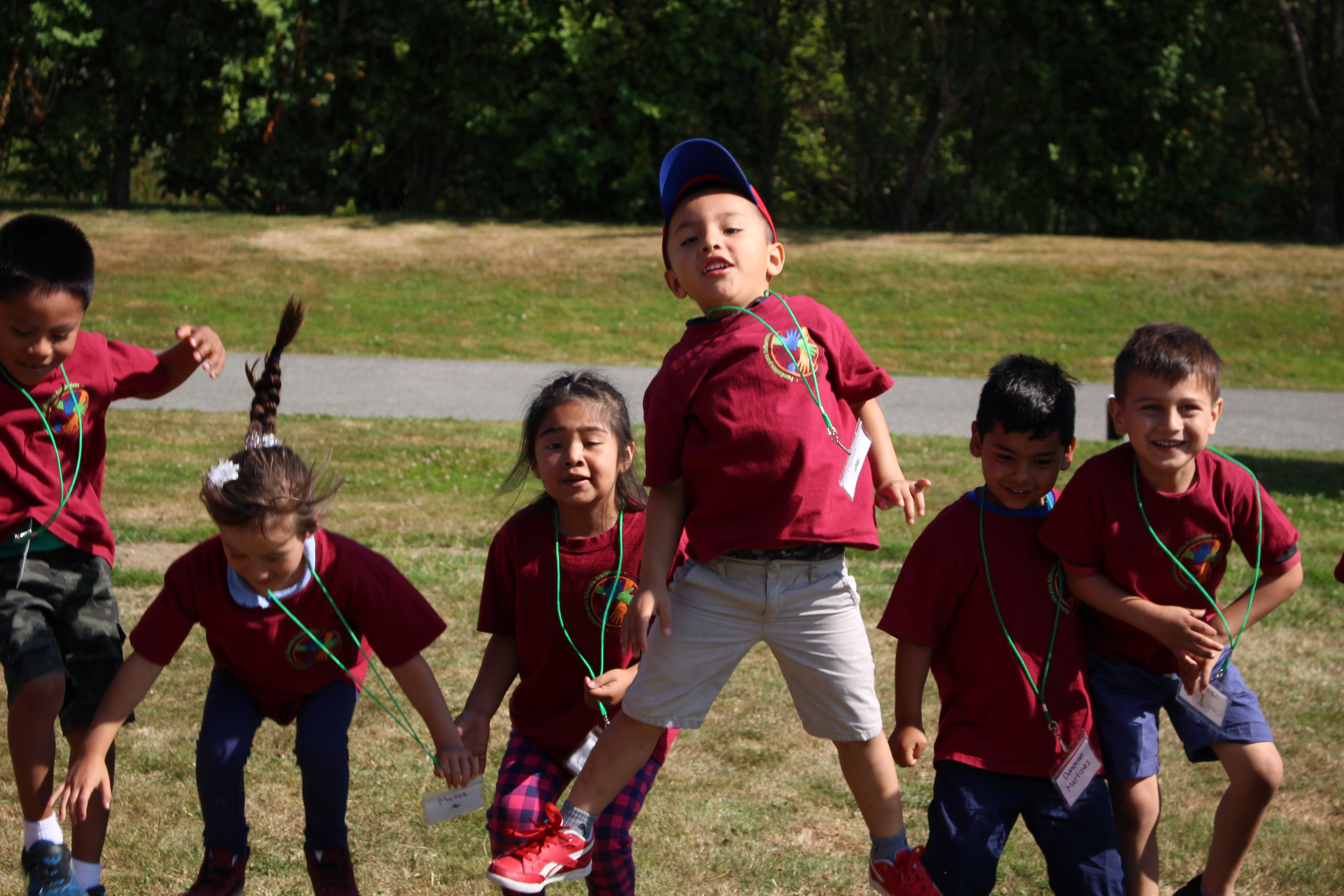 Kids jumping at summer camp