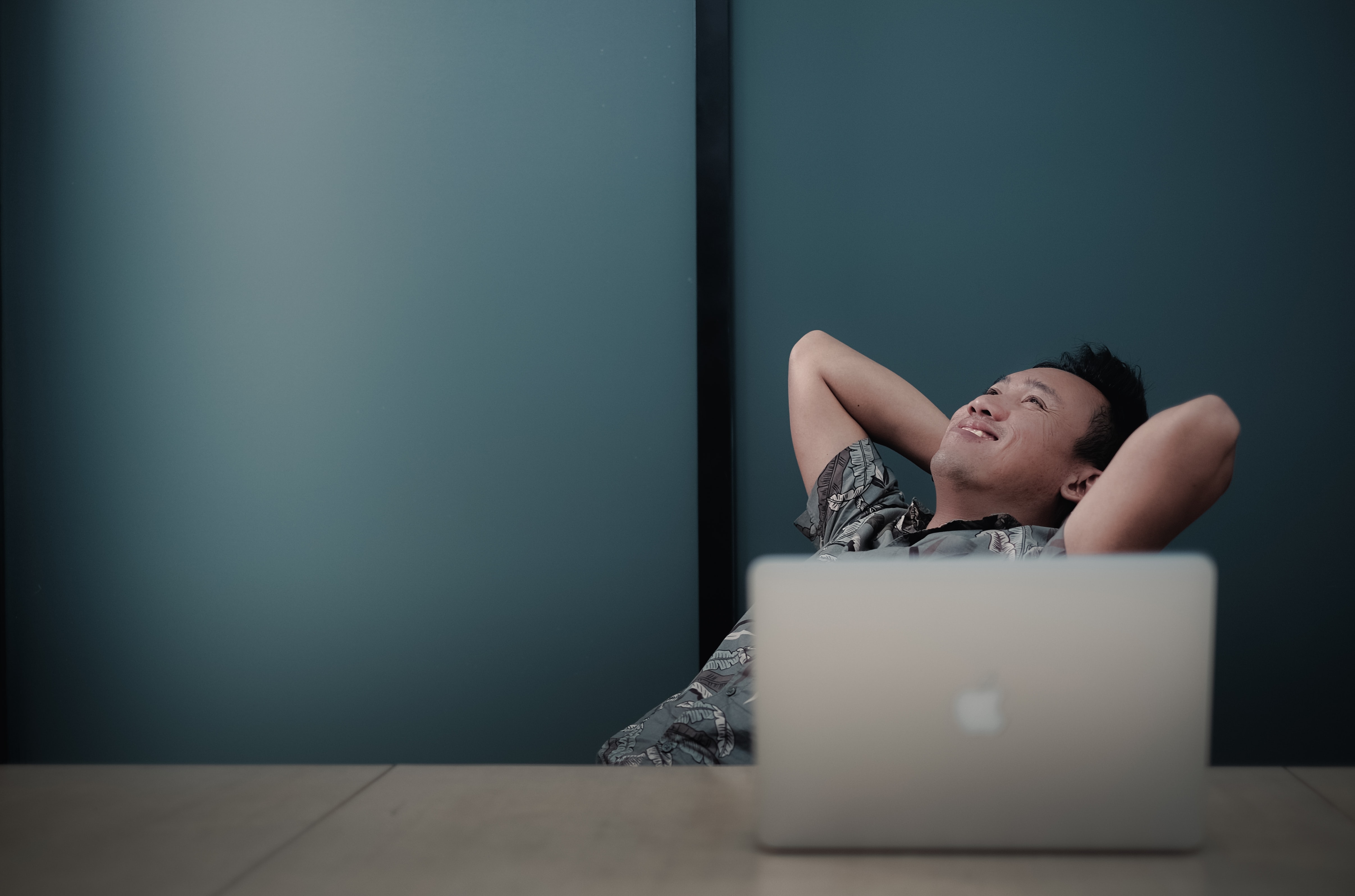 Happy man with laptop