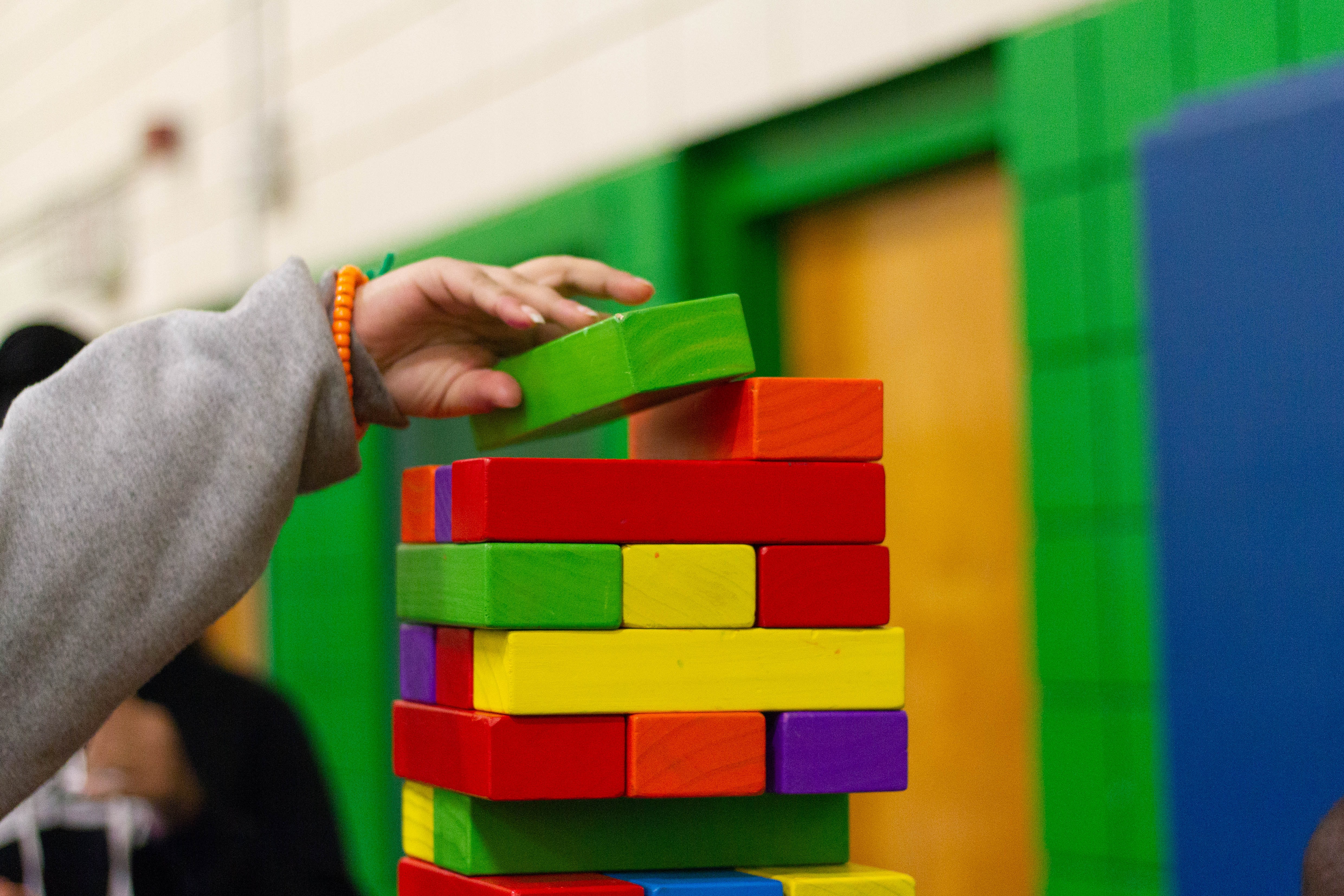 Student adding blocks