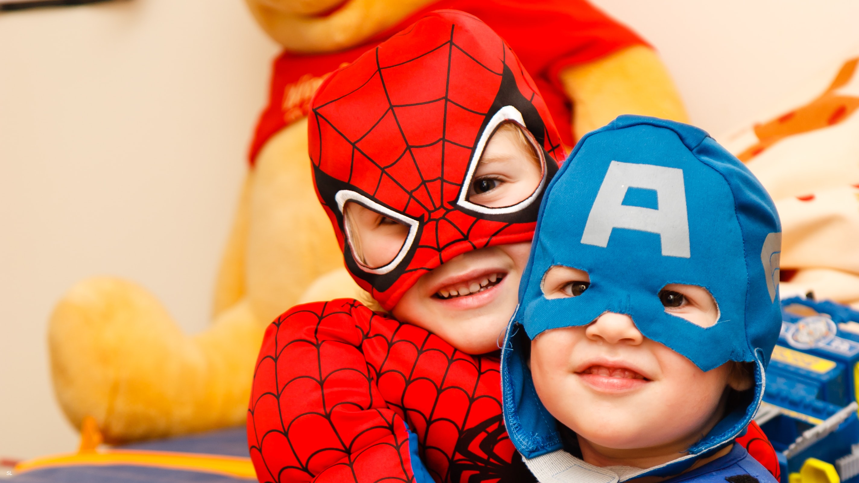 Kids in super hero costumes